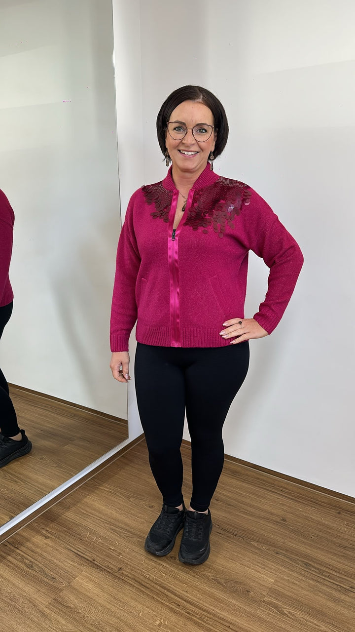 Pinke Strickjacke mit Pailletten