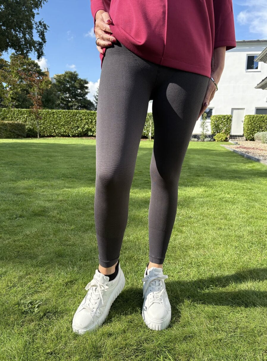 Zilveren golf compressiebroek met driedimensionaal golfweefsel